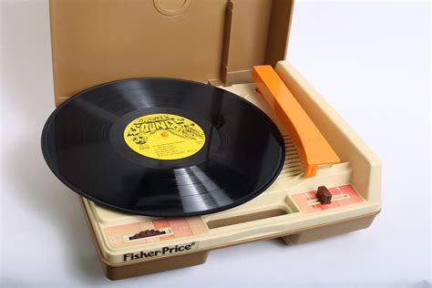 Vintage 1970s Fisher Price Record Player in Orange