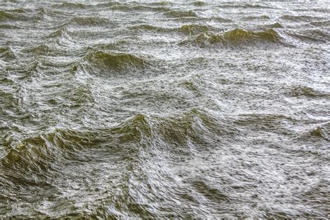 Heavy rain storm and waves water texture Oste river Germany. 11275495 ...