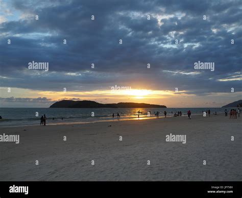 Golden sunset view in beach Stock Photo - Alamy