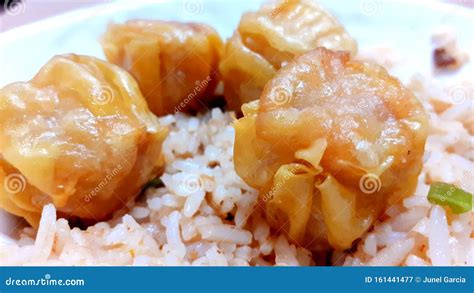 Yummy Fried Siomai With Fried Rice! Filipino Foods. Stock Photo | CartoonDealer.com #161441477