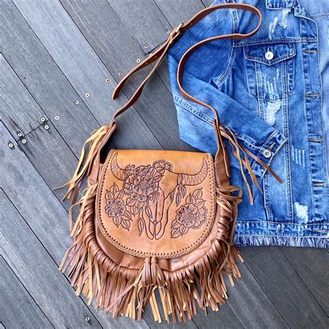 HAND TOOLED BUFFALO & FRINGE SADDLE BAG – Shoe Shu