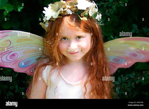 Child as angel hi-res stock photography and images - Alamy