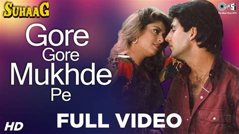 GORE GORE MUKHDE PE KALA KALA CHASMA LYRICS - Suhaag (1994) - Alka Yagnik, Udit Narayan ...