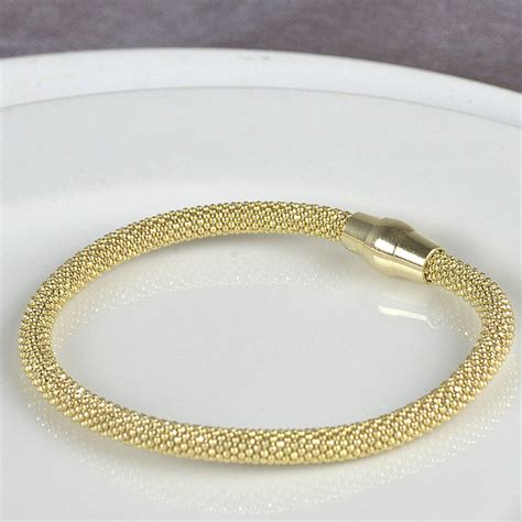 gold plated mesh bracelet with magnetic clasp by tales from the earth | notonthehighstreet.com