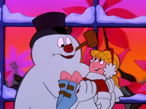 Frosty with Karen in his arms. | Frosty the snowmen, A christmas story, Christmas cartoons