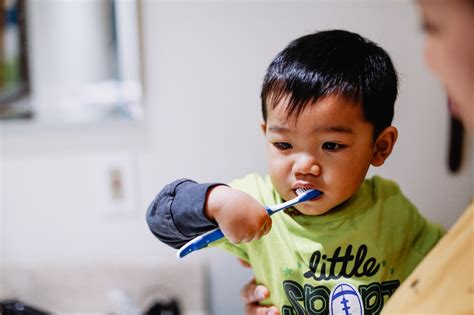 Yes, Your Toddler Needs to Brush Their Teeth - Motherly