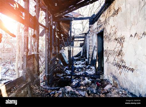 Consequences of fire. Completely burnt old rural house Stock Photo - Alamy