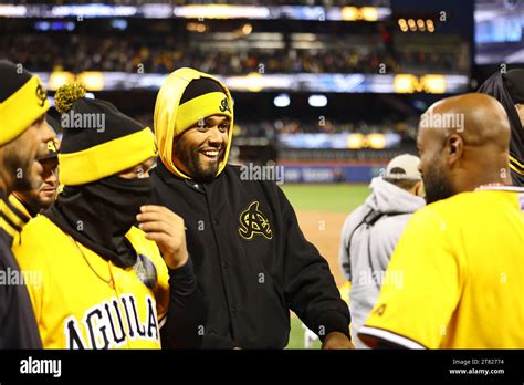 Las Águilas Cibaeñas players celebrate after sweeping three game series ...