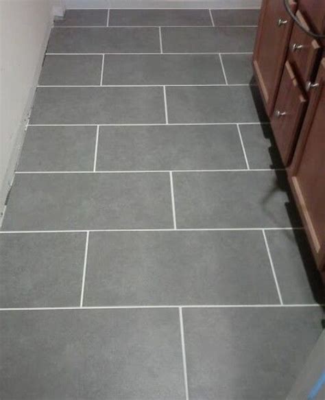 Grey tile white grout | Grey flooring, Bathroom flooring, Kitchen flooring