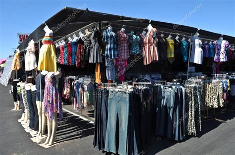 Clothes for Sale at Flea Market — Stock Photo © slickspics #11081888