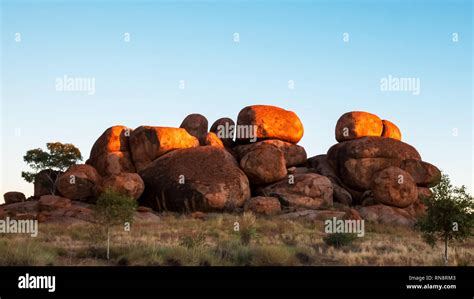 devil's marbles in australia's northern territory at sunrise Stock ...