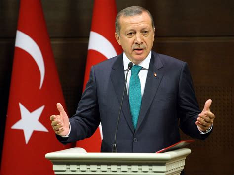 Turkish Prime Minister Recep Tayyip Erdogan removes ban on headscarves ...