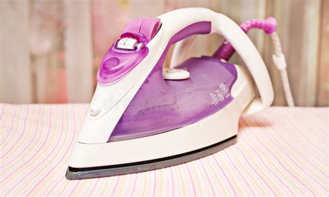 Ironing Clothes with Steam Iron Stock Photo - Image of girl, warm: 7323748