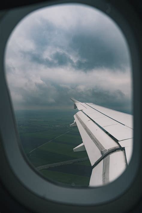 Airplane Window View of Clouds · Free Stock Photo