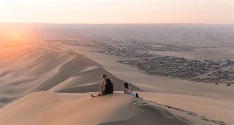 Sandboard Down Desert Dunes in Huacachina - Trazee Travel