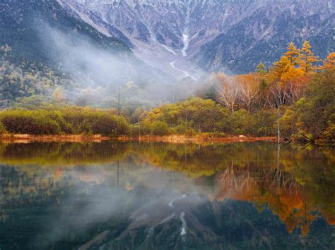 Taisho pond is a popular walk in Kamikochi due to the mirror-like ...