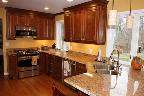 Granite Countertops For Cherry Kitchen Cabinets | Cherry cabinets kitchen, Kitchen design, Brown ...