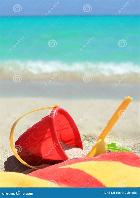 Tropical Beach Toys and Ocean Stock Photo - Image of tropics, vacation: 43125156