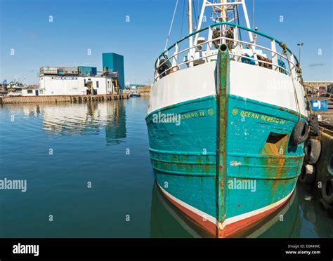 PETERHEAD HARBOUR ABERDEENSHIRE OLD TRAWLER MOORED AT QUAY AND PETERHEAD ICE FACTORY Stock Photo ...