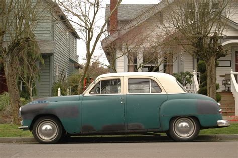 OLD PARKED CARS.: 1952 Plymouth Cranbrook.