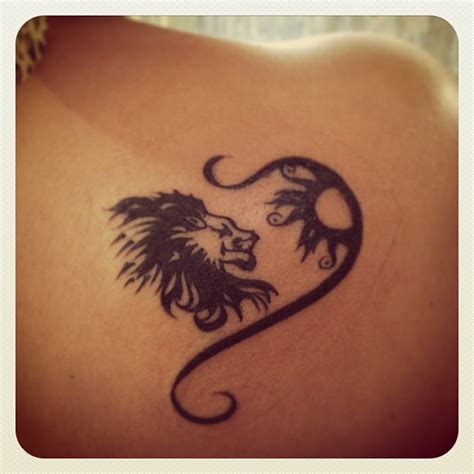 Leo And Tribal Sun Tattoo On Right Back Shoulder | Tattooshunt.com