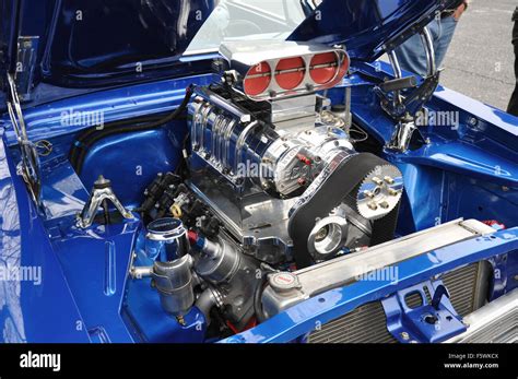 A Custom Supercharged Engine at a car show Stock Photo - Alamy