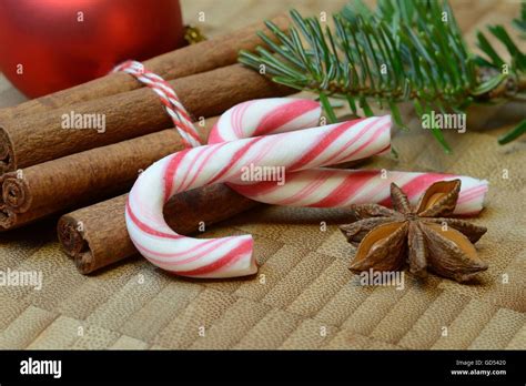 Spices and candy canes Stock Photo - Alamy