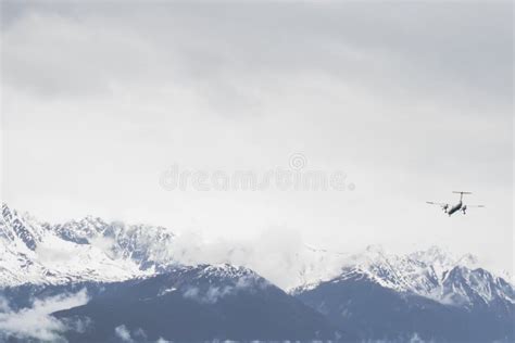 Plane Flying Over Snowy Mountains Stock Image - Image of european, austria: 66424889