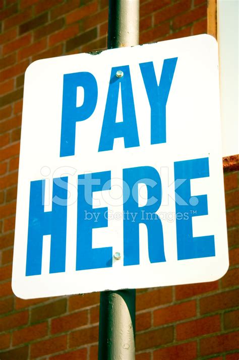 Pay Here Sign Stock Photo | Royalty-Free | FreeImages