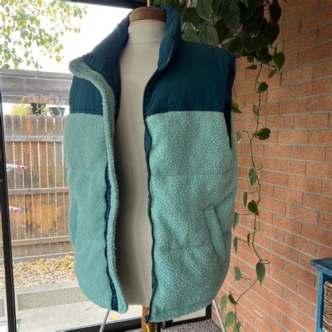 Winter sherpa vest in light blue / dark blue green... - Depop