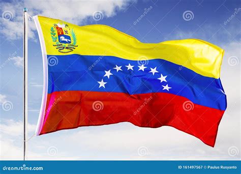 Venezuela National Flag Waving Under Blue Sky Stock Image - Image of ...