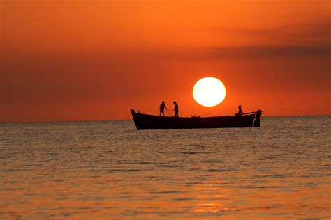 HD wallpaper: silhouette of persons riding row boat, sunset, sea, water ...