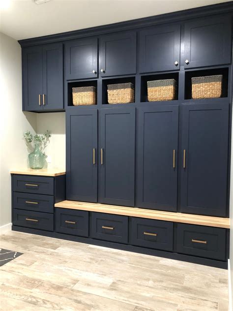 Custom built-in lockers in for drop zone area. C&E Builders used Benjamin Moore Hale Navy for ...