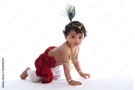 Adorable baby boy wearing Krishna costume Stock Photo | Adobe Stock