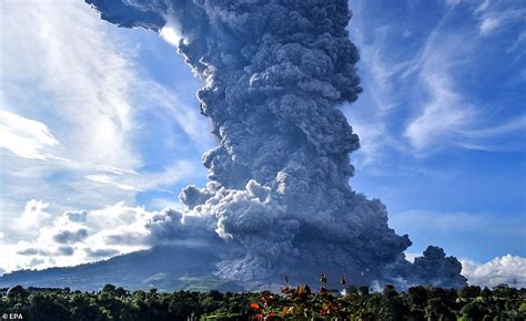 Indonesian volcano Mount Sinanbung spews Ash three miles into the air ...