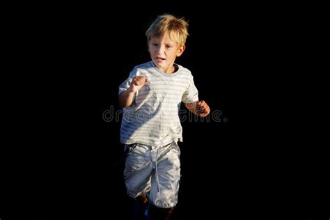 Scared boy running away stock image. Image of childcare - 15892369