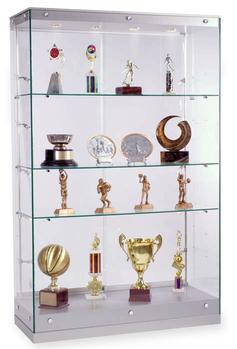 a glass display case filled with lots of trophies