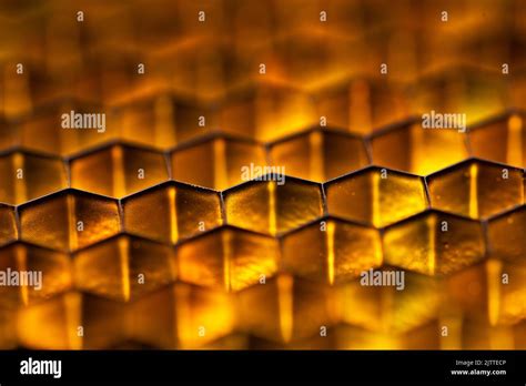 Golden yellow shiny honeycomb grid background Stock Photo - Alamy