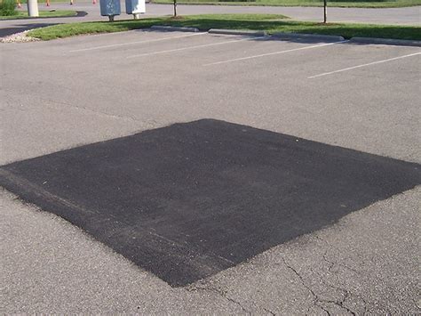 Best Ways to Patch Asphalt for Parking Lots and Driveways - Arnold Asphalt