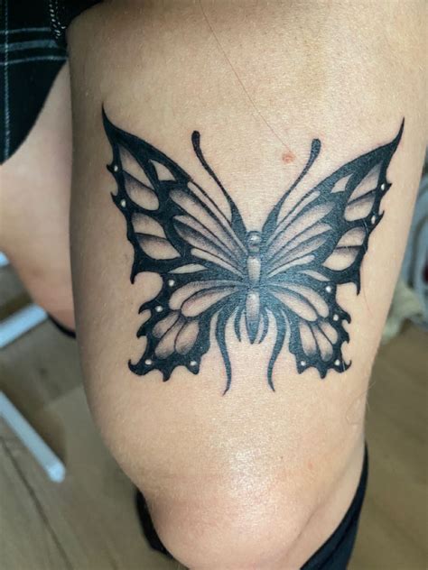 Black gothic, grunge, alternative butterfly tattoo on upper leg for ...