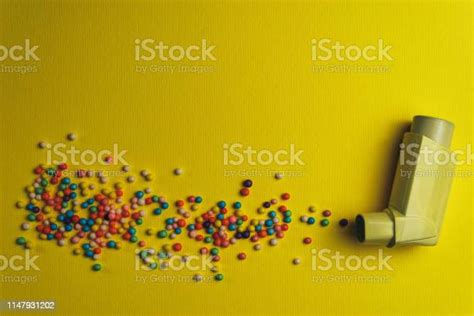 Yellow Asthma Inhaler With Particle Aerosol Spay Made By Color Preparations On A Yellow ...