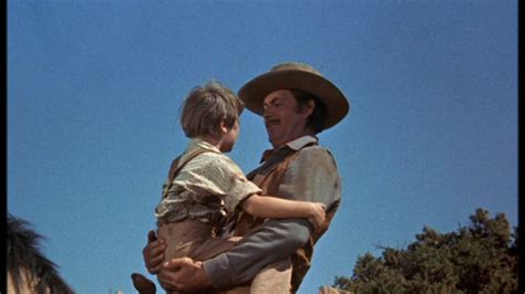 Kevin Corcoran as Arliss and Fess Parker as Jim Coates in Old Yeller - Old Yeller Photo ...