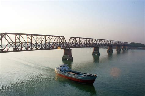 Boat Passing From Under Bridge by Manzur Anam Photography