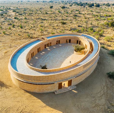 Diana Kellogg Architects' oval-shaped girl's school is made of hand-carved sandstone in rural India