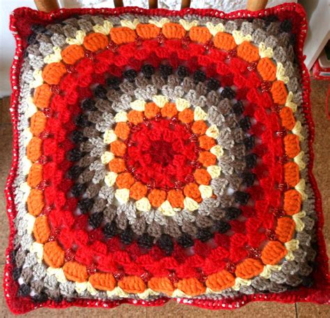 a year above the shop: A crochet cushion