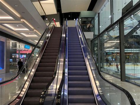 Escalator lighting in Shopping Mall "Akropole" in Riga | AIPLights