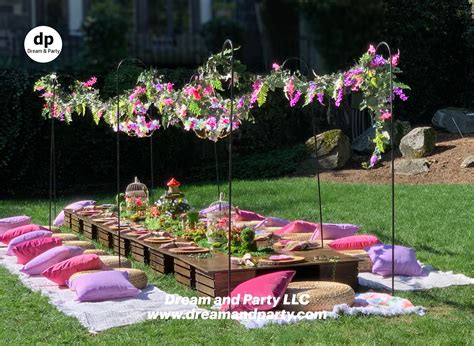 Enchanted fairy garden party floating flower garlands birthday party ...