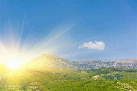 Premium Photo | Landscape mountains and trees at sunrise