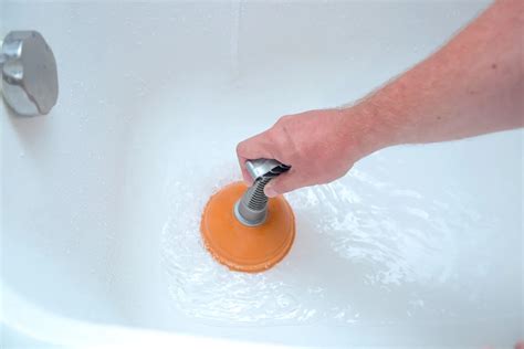 How To Unclog A Bathtub Drain With A Plunger? | Storables