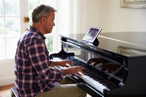 Man Learning To Play Piano ⬇ Stock Photo, Image by © monkeybusiness ...